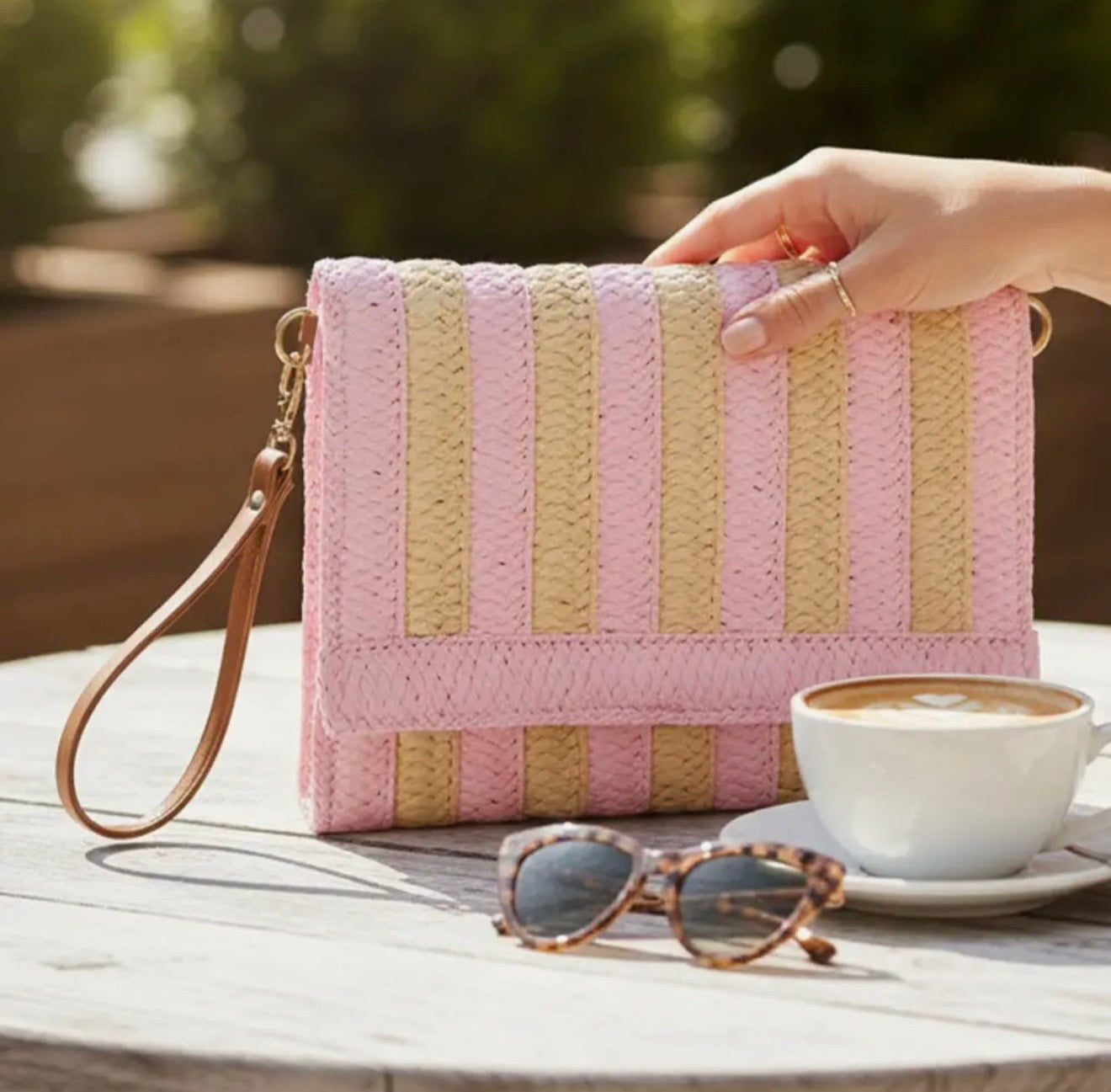 pink and natural striped woven foldover clutch with wristlet strap boutique handbag