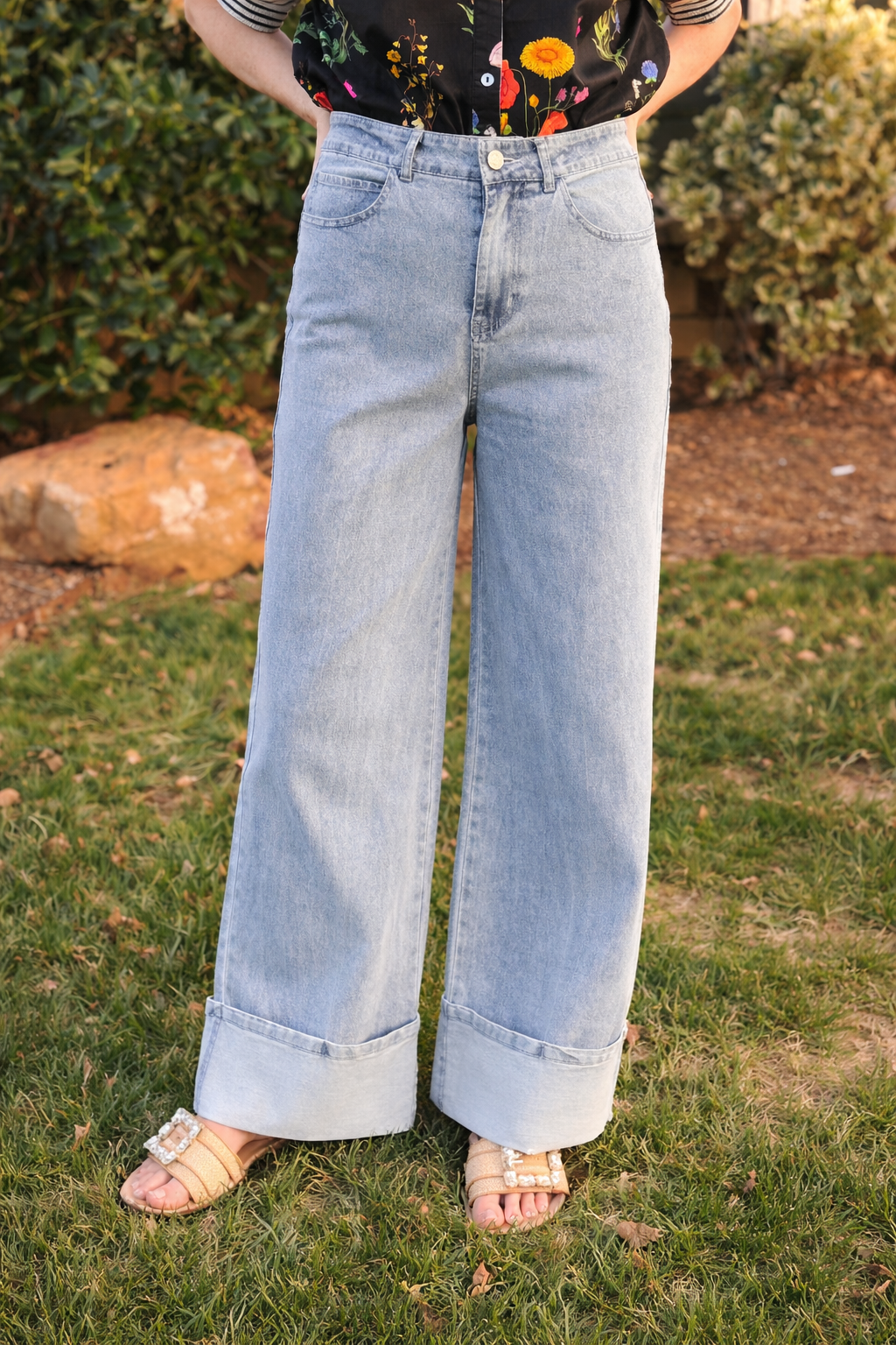 light wash wide leg denim jeans with cuffed hem ankle length and classic pocket design boutique women’s denim