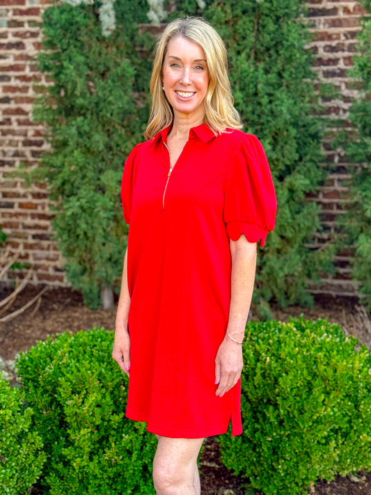 Red mini dress with zip neckline, puff sleeves, and casual relaxed fit