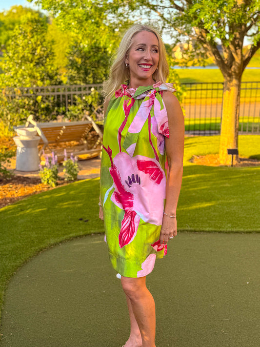 Bold green and pink floral halter shift dress with oversized print and relaxed fit