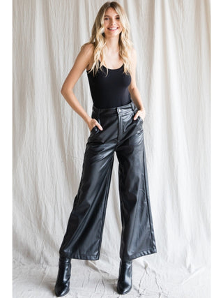 Black faux leather pants