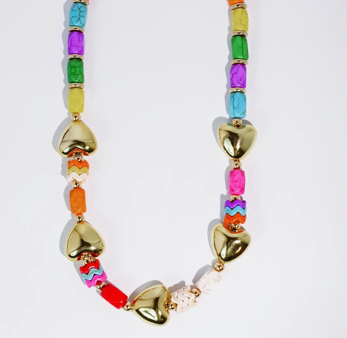colorful heart beaded statement necklace with gold heart beads and vibrant stone accents